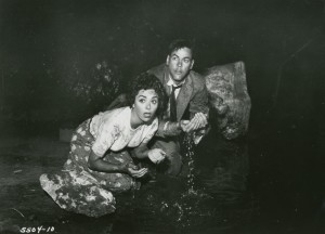 Becky and Miles in the cave, wondering if this is the end of the world.