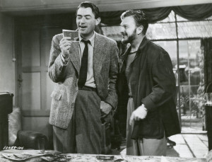 Joe and Irving (Eddie Albert) enjoy one of Irving's sneaky photos of Ann.