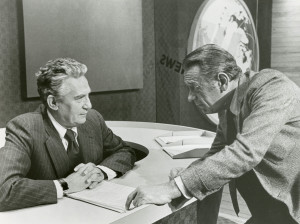 News anchor Howard Beale (Peter Finch) is counseled by friend Max Schumacher (William Holden).
