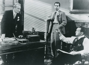 Insurance men x (Richard Gaines), Walter Neff (Fred MacMurray) and Barton Keyes (Edward G. Robinson.